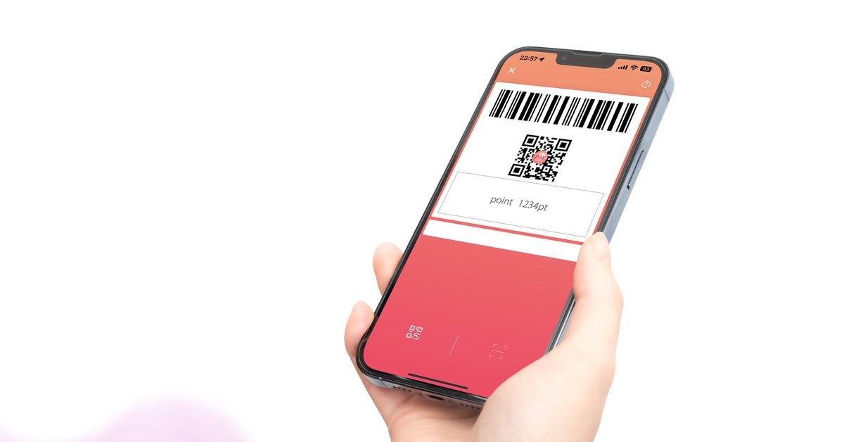 スマートフォンの決済画面を表示した手元
